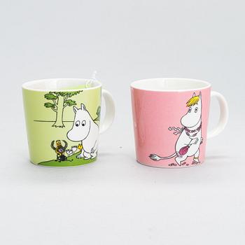 Eight Moomin Characters mugs in vitro porcelain, Arabia, Finland.