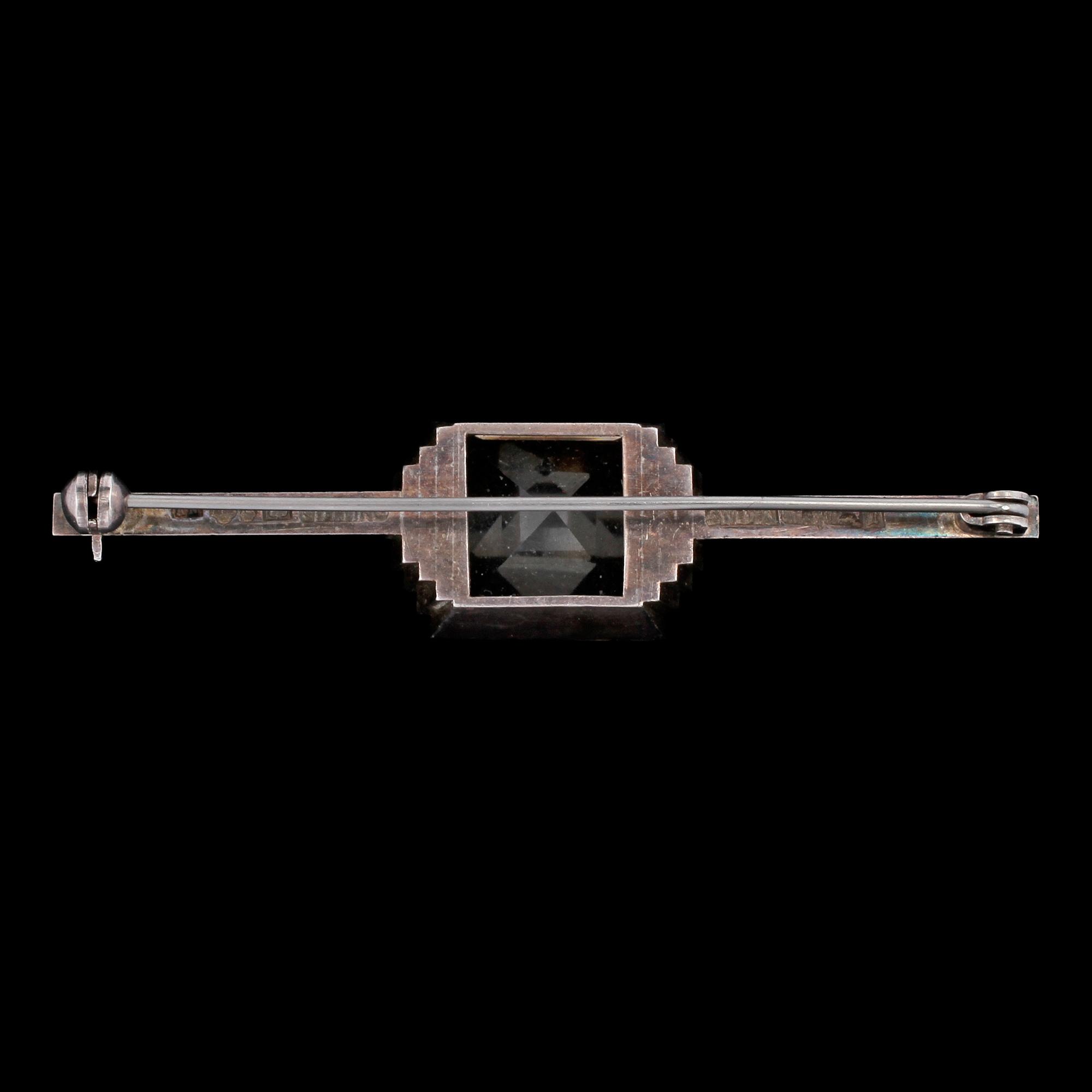 BROSCH, sterlingsilver och fasettslipad bergskristall, Wiwen Nilsson, Lund, 1657. Vikt 12 g.