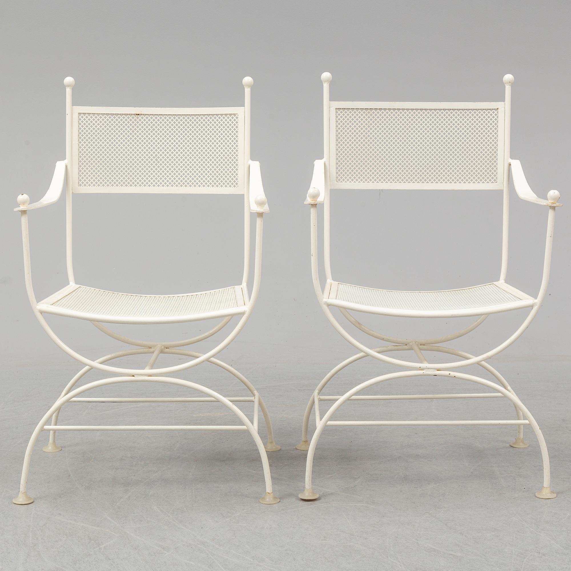 A set of six 20th century painted metal garden/patio chairs.