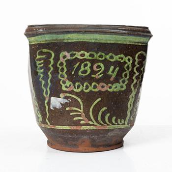 Stoneware planter and stand, dated 1824.