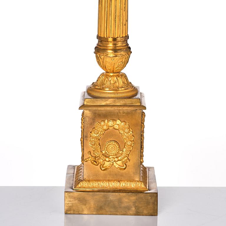 A French late Empire gilded six-light candelabra, mid 19th century.