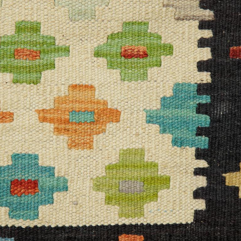 A rug, Kilim, ca 352 x 260 cm.