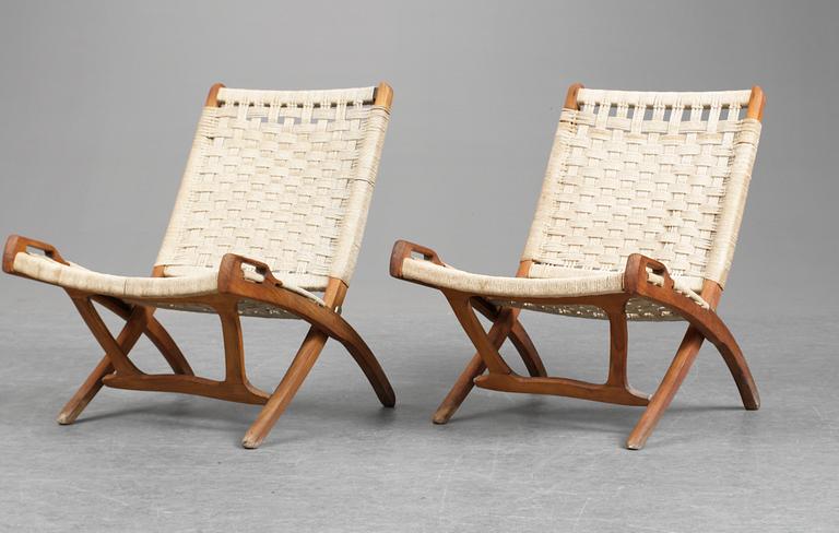 A pair of 20th cent teak folding chairs, after a model by Hans J Wegner.