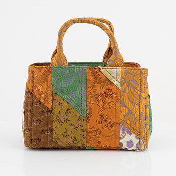 Prada, a embroidered silk 'Broccato patch' bag.