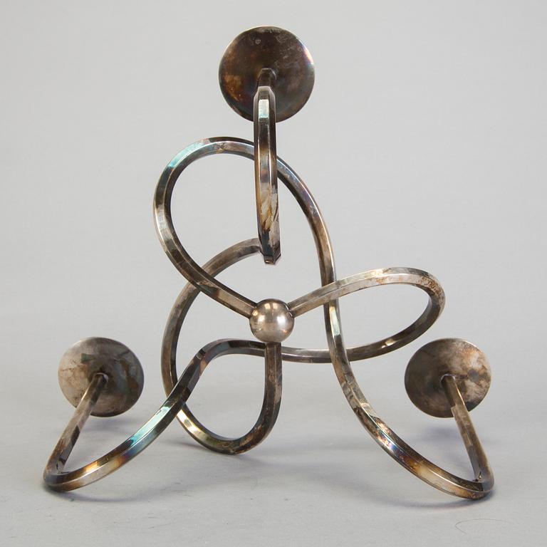 LJUSSTAKE, "Vänskapsknuten", försilvrad, Josef Frank för Svenskt Tenn, formgiven 1938.