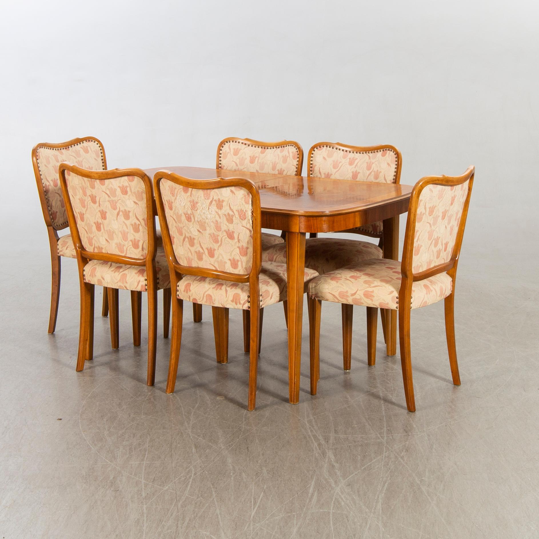 A 1950/60's dining table and chairs.