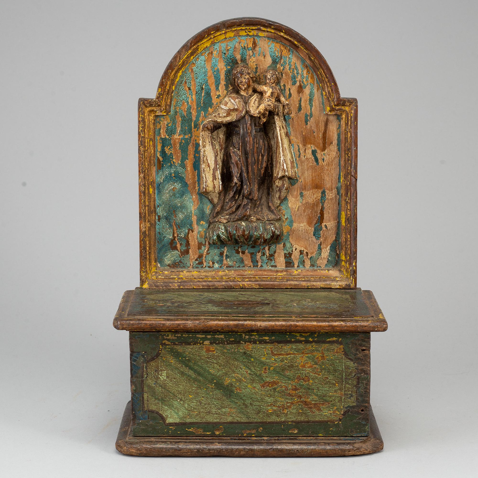 A painted wood alms box, probably 17th century.