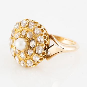 Gold ring with cultured pearl and rose-cut diamonds.