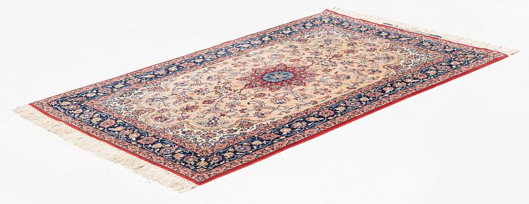 A Seirafian Esfahan rug, signed (Ahmad) Seirafian, ca 178 x 110 cm (as well as one end with 3 cm flat weave).