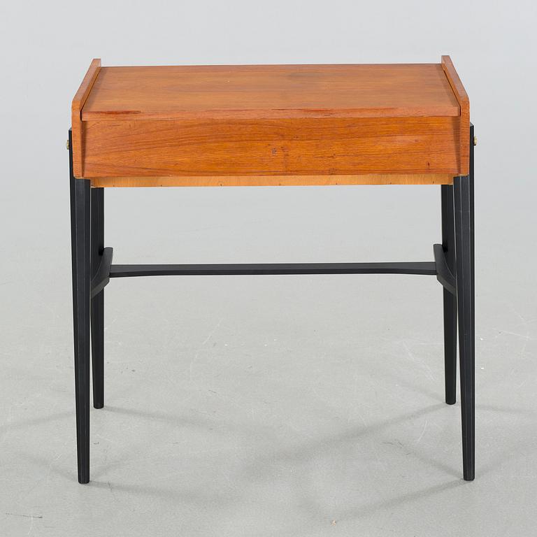 A mid 20th century dressing table and stool.