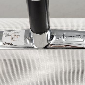 A pair of 'EA 108' desk chairs by Charles & Ray Eames for Vitra.