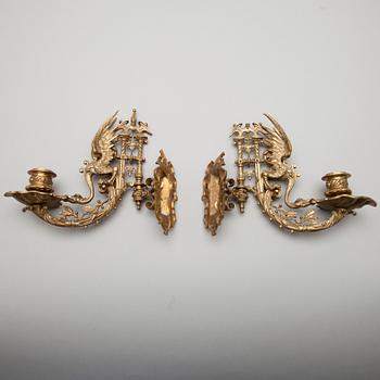 PIANOLJUSSTAKAR, ett par, brons, 1800-talets slut.