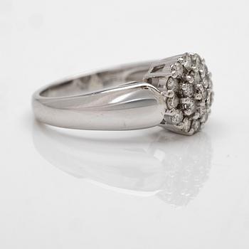 18K white gold ring with diamonds.