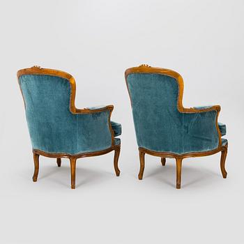 A pair of Louis XV style armchairs, mid-20th century.