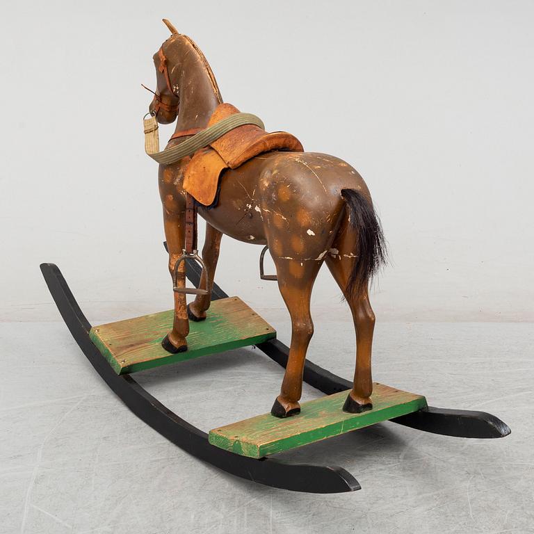 A first half of the 20th century wooden rocking horse.