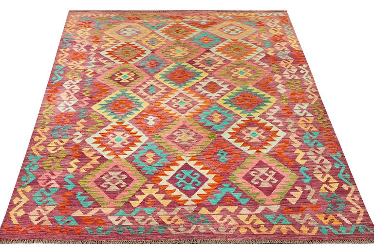 A Kilim carpet, c. 296 x 202 cm.