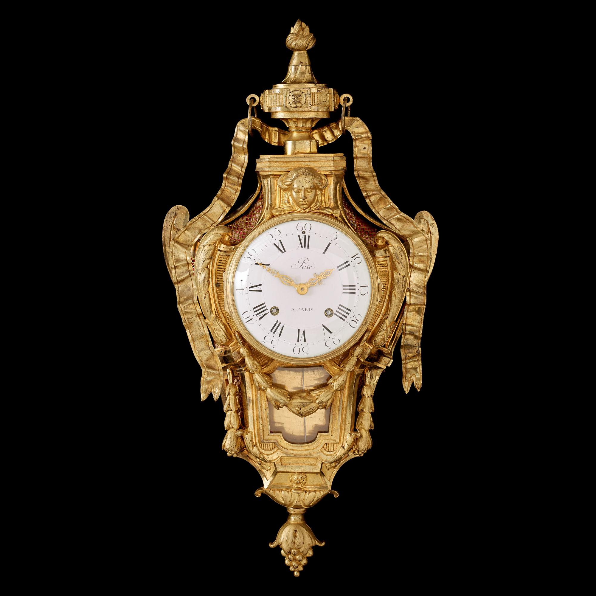 A Louis XVI late 18th century gilt bronze wall-clock signed "Paté A PARIS".