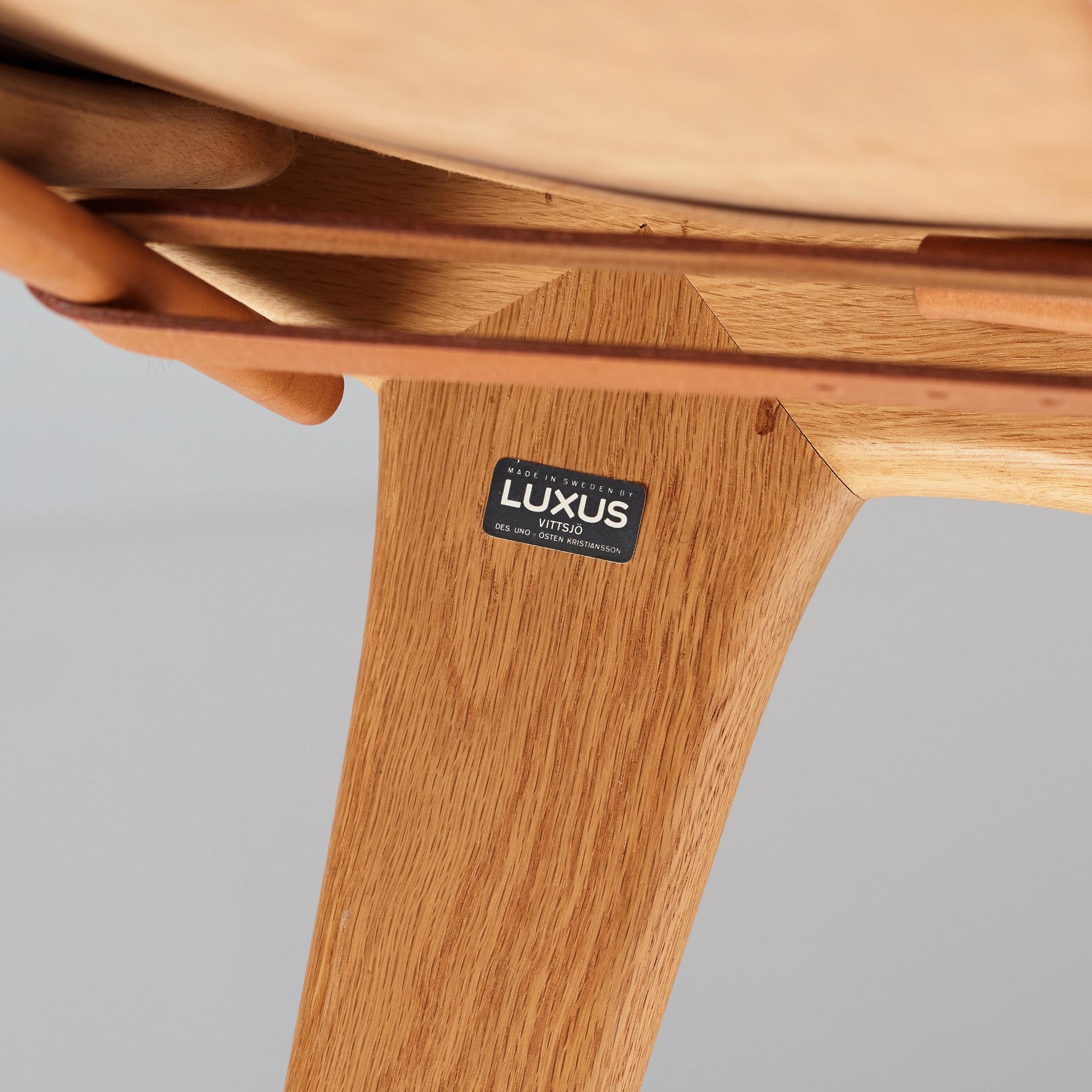 UNO & ÖSTEN KRISTIANSSON, a pair of "Hunting chairs" model 204, for Luxus, Vittsjö, Sweden 1960's.