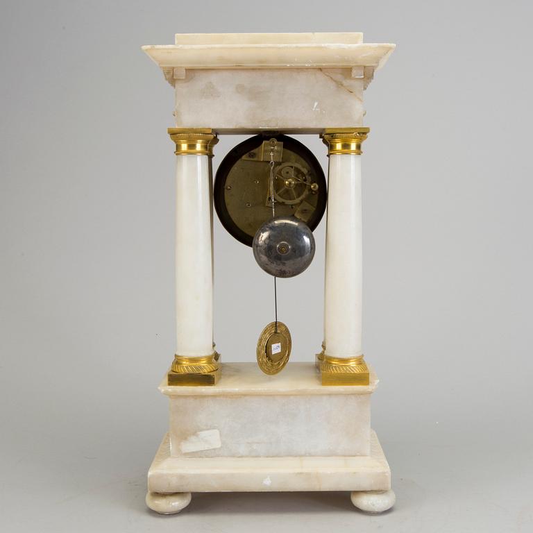 AN ALABASTER AND GILT BRASS TABLE CLOCK, mid 19th century.