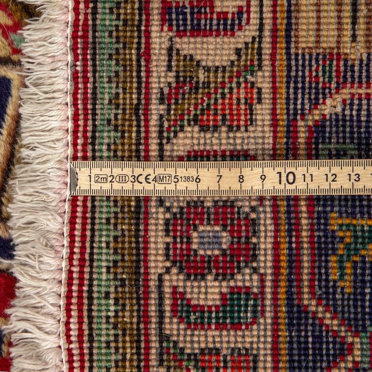 A carpet, Tabriz, ca 345 x 240 cm.