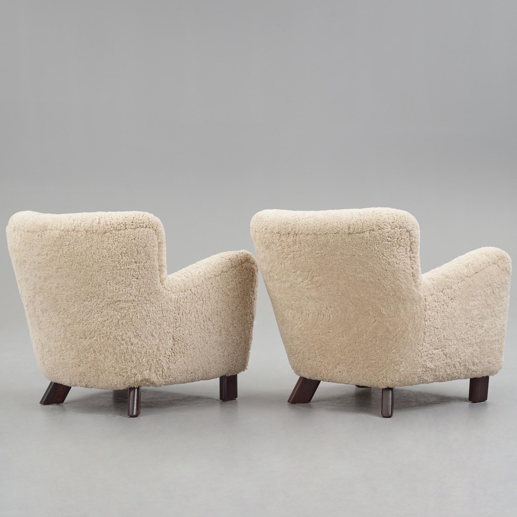 Fritz Hansen, a pair of "1669", easy chairs for Fritz Hansen, Denmark 1940's.