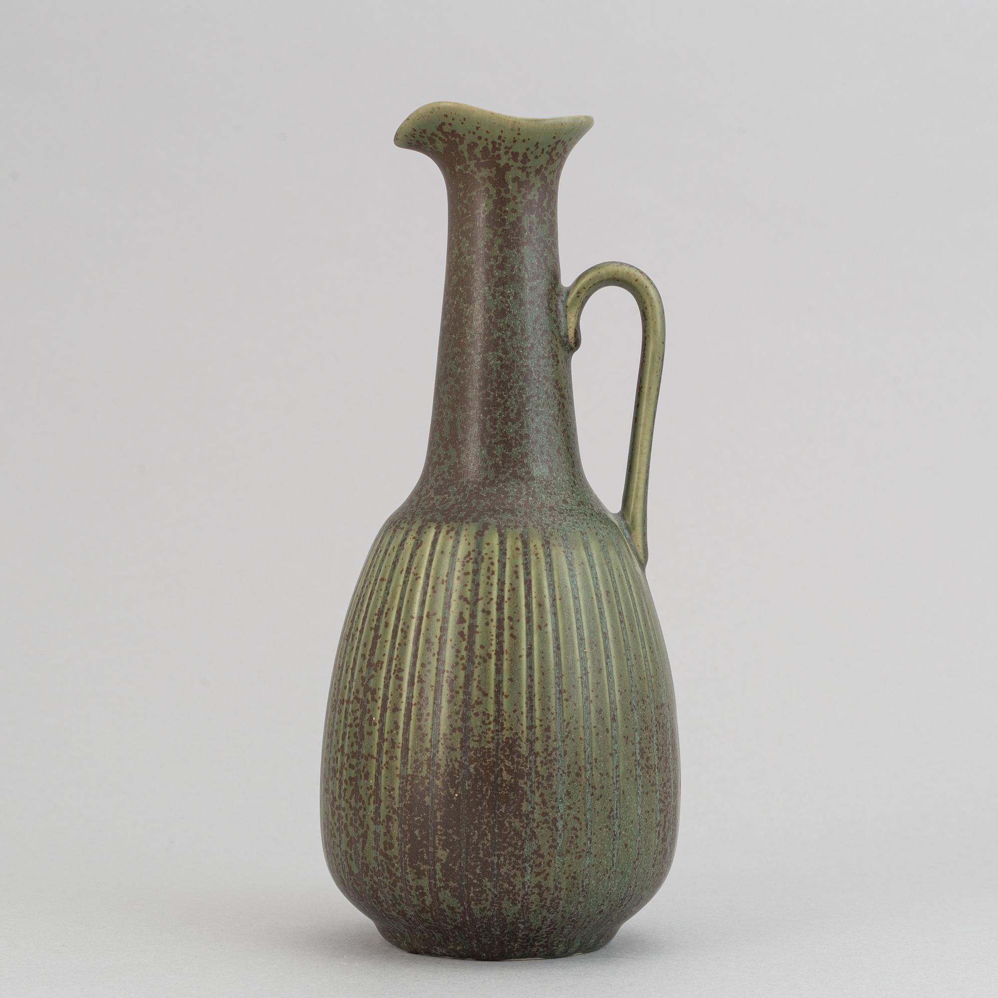 Gunnar Nylund, a set of six stoneware bowls, two miniature vases and a vase for Rörstrand.