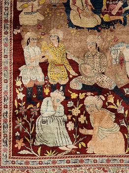 A CARPET, a semi-antique silk Tabriz figural, signed Haddad, 180,5 x 123,5 cm.