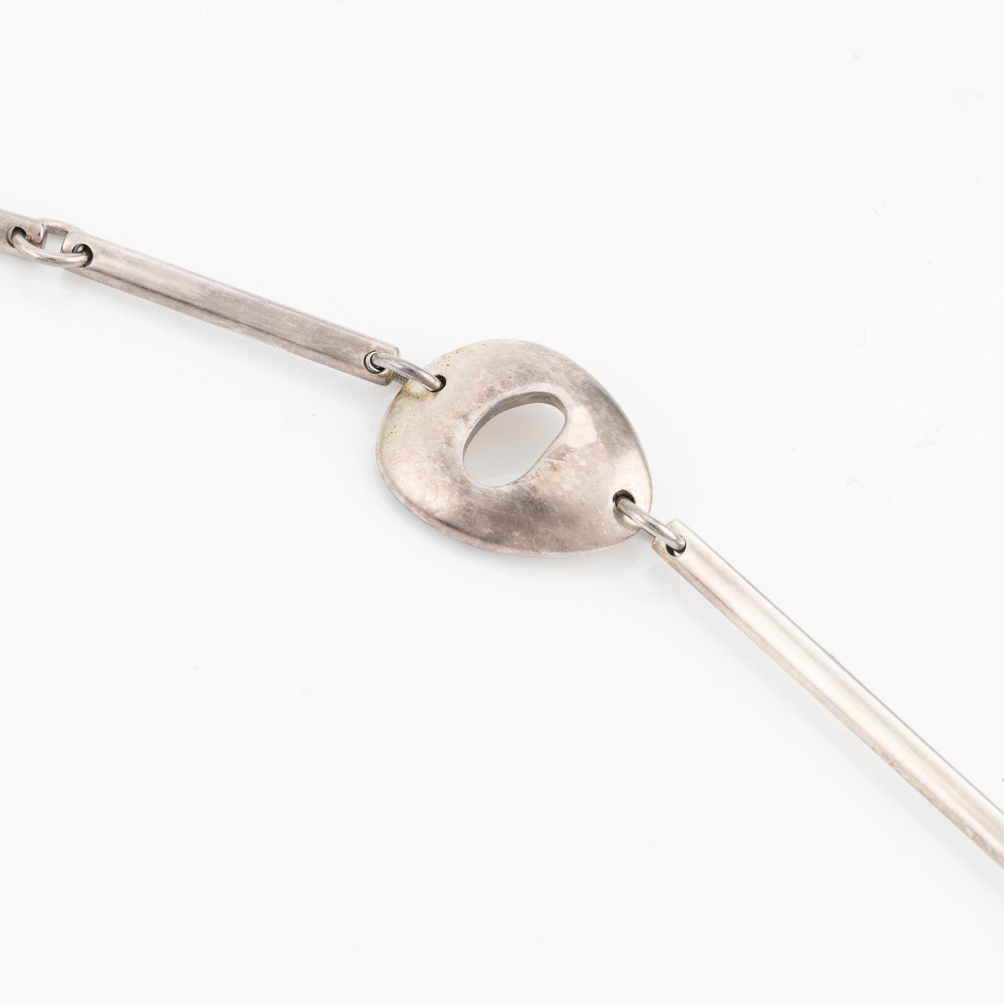 Georg Jensen, a necklace and a pair of earrings, sterling silver.