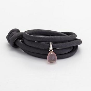 Ole Lynggaard, A silk, rose quartz, diamond 0.015 ct and 18K white gold bracelet. Denmark.