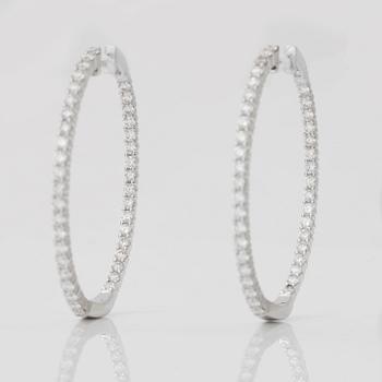 A pair of brilliant-cut diamond earrings. Total carat weight circa 2.30 cts.