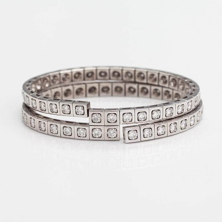 Cartier, Rannekoru "Tectonique", 18K valkokultaa, briljanttihiottuja timantteja n. 11.90 ct yht. Merkitty CT6808, JC.