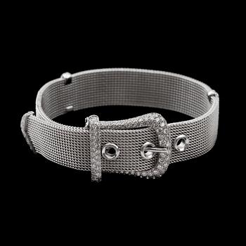 1003. A Tiffany & Co diamond, app. tot. 3.00 cts, set bracelet in the shape of a belt.