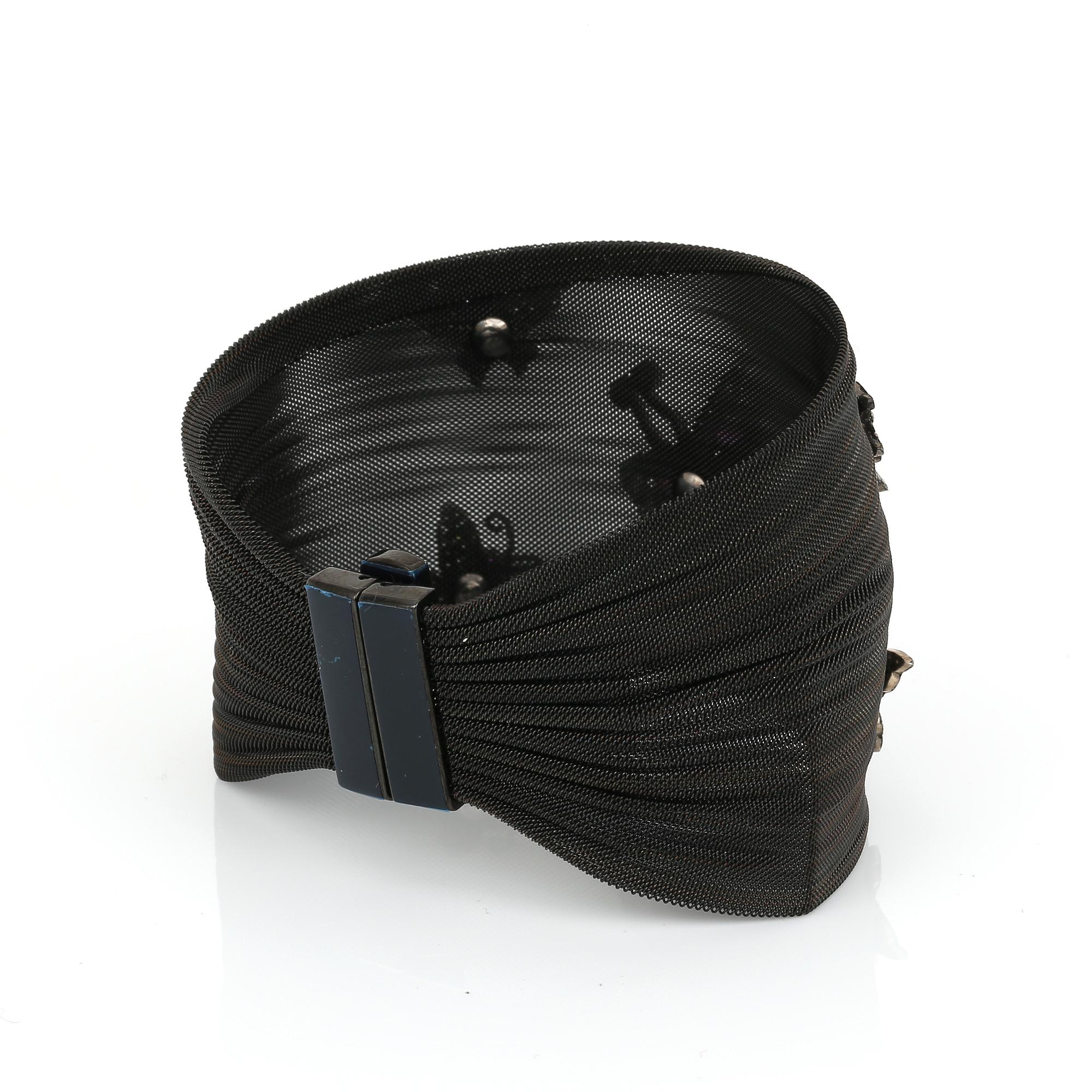 ARMBAND, rostfritt svart stål, rubiner och små diamanter.