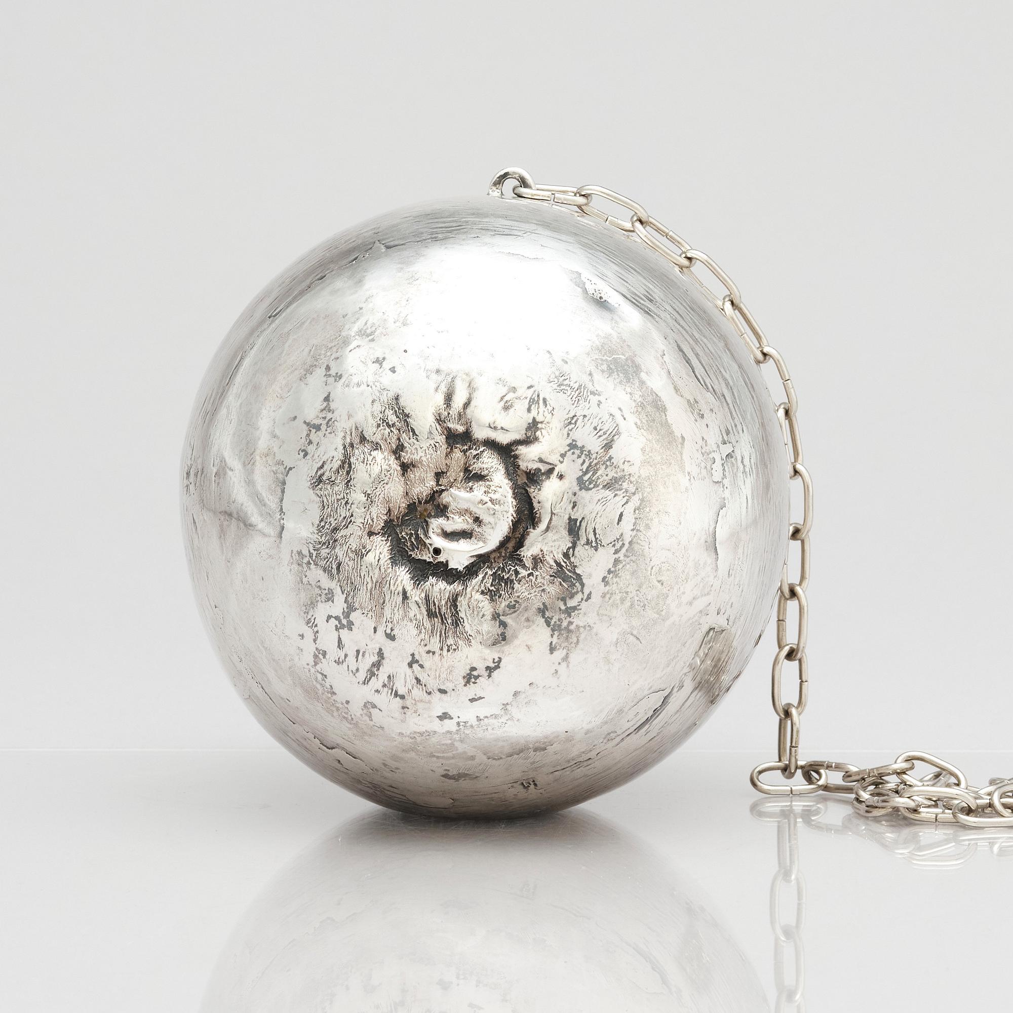 Olle Ohlsson, a silver 'man in the moon' sculpture, Stockholm.