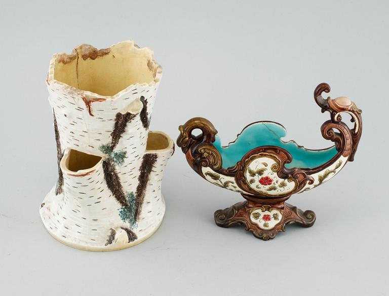 A pair of consoles, a pot and a jardinière in majolica, made by Gustavsberg and Rörstrand around year 1900.
