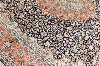 A silk carpet, Kashmir, c. 357 x 274 cm.