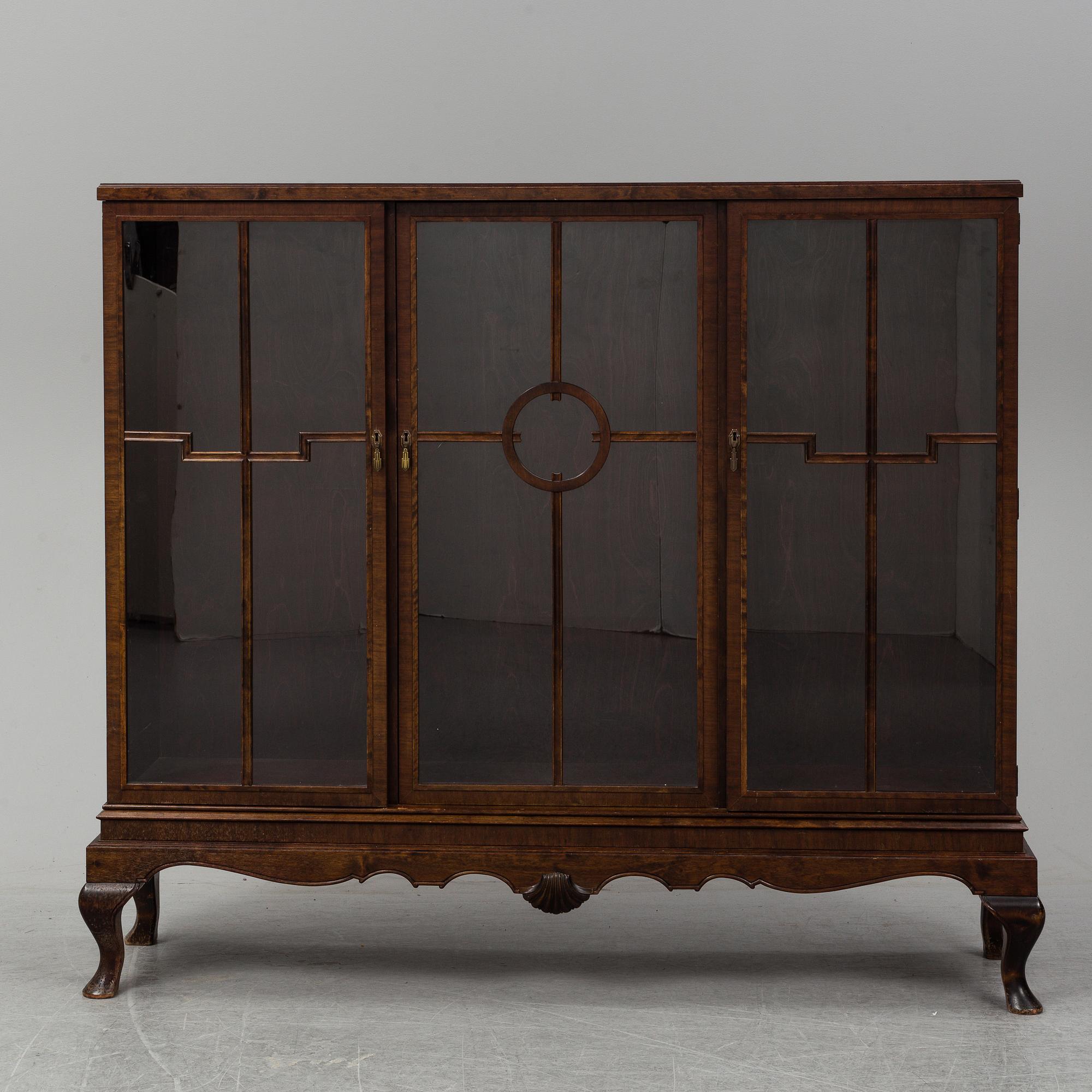 A 1920's/30's vitrine cabinet.
