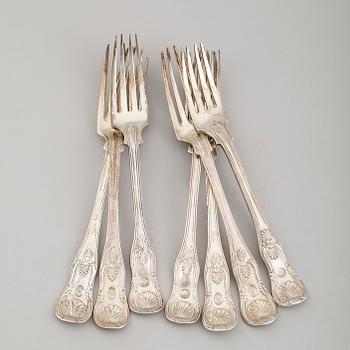 BORDSGAFFLAR, 7 st, snarlika, silver, bl a Möllenborg, 1800-talets andra hälft. Vikt ca 500 gram.