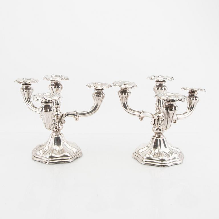 A Swdish 20th century pair of silver candelabra maark of CG Hallberg Stocholm 1946.