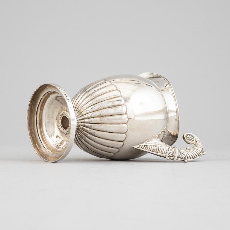 A Swedish empire parcel gilt silver creamer, mark of Anders Lundqvist, Stockholm 1828.