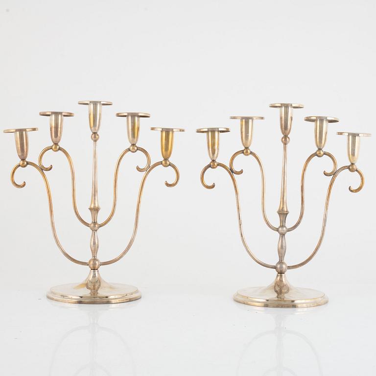 A pair of silver plated candelabra, mark of CG Hallberg, Stockholm.