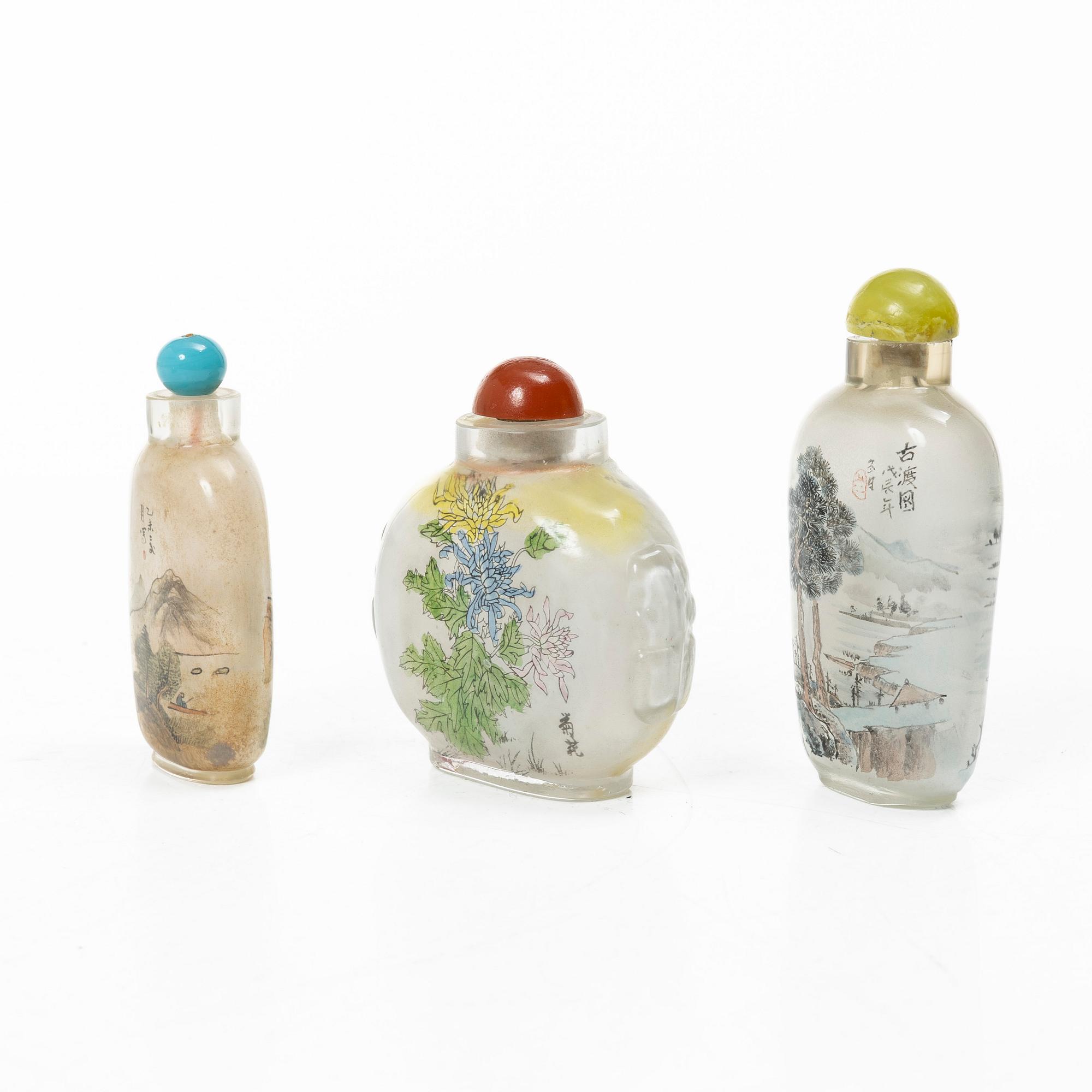 A group of three Chinese glass snuffbottles, 20th century.