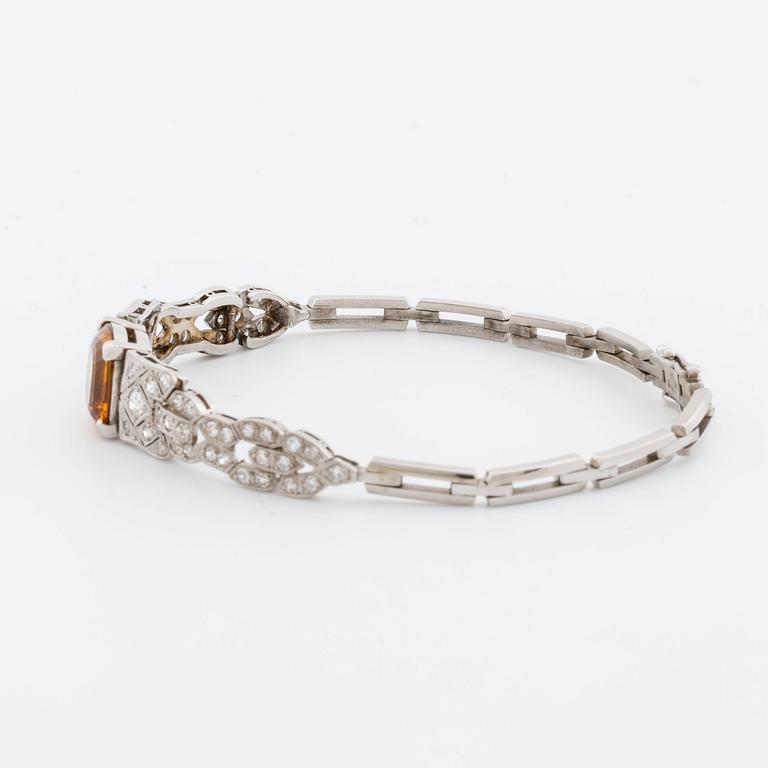 BRACELET platinum and 18K whitegold, 1 citrine, 2 old-cut and 8/8-cut diamonds approx 0,80 ct, G  Dahlgren & Co Malmö.