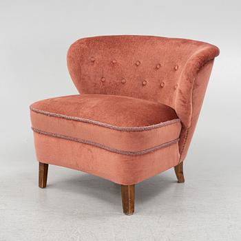 Swedish Modern, an armchair, 1940/50s, the model has been sold via Gösta Jonsson.