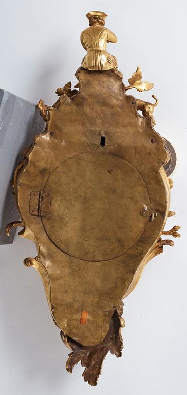 A Louis XV mid 18th century gilt bronze wall clock, "Chasse", in the style of J J de Saint Germain,