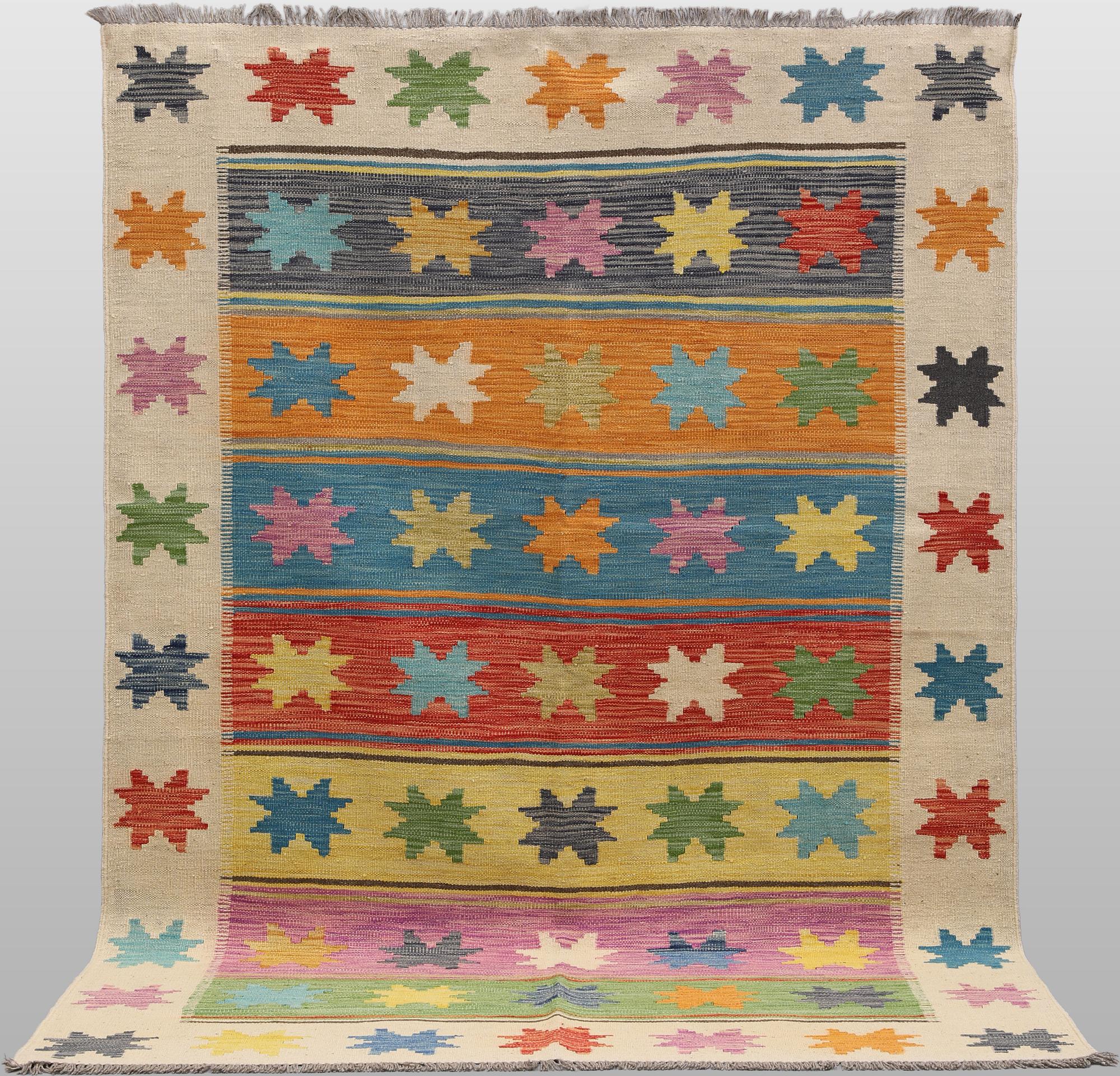 A Kilim rug, approx. 251 x 175 cm.