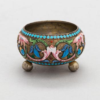A salt cellar, mark of D. Nikitin, and 2 spoons, poss. P. Abrosimov and M. Andreyevna, enamel, silver. Moscow 1899-1908.