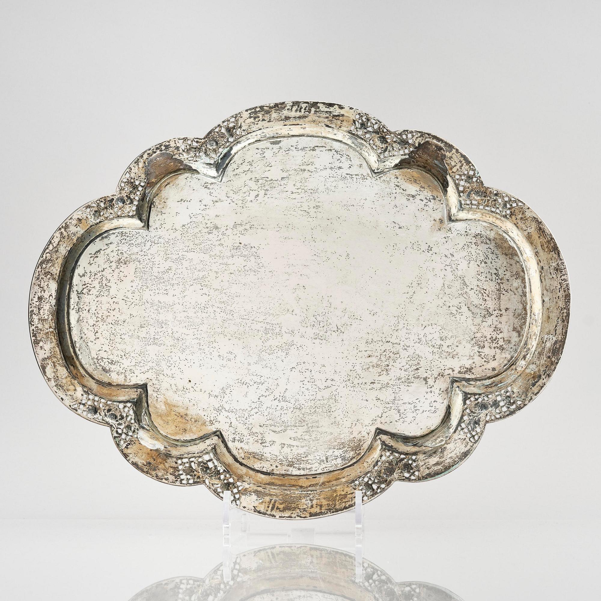A lobed silver tray on four feet, Shanghai, Singfat, China Trade.