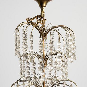 A four-light Gustavian-style chandelier, circa 1900.
