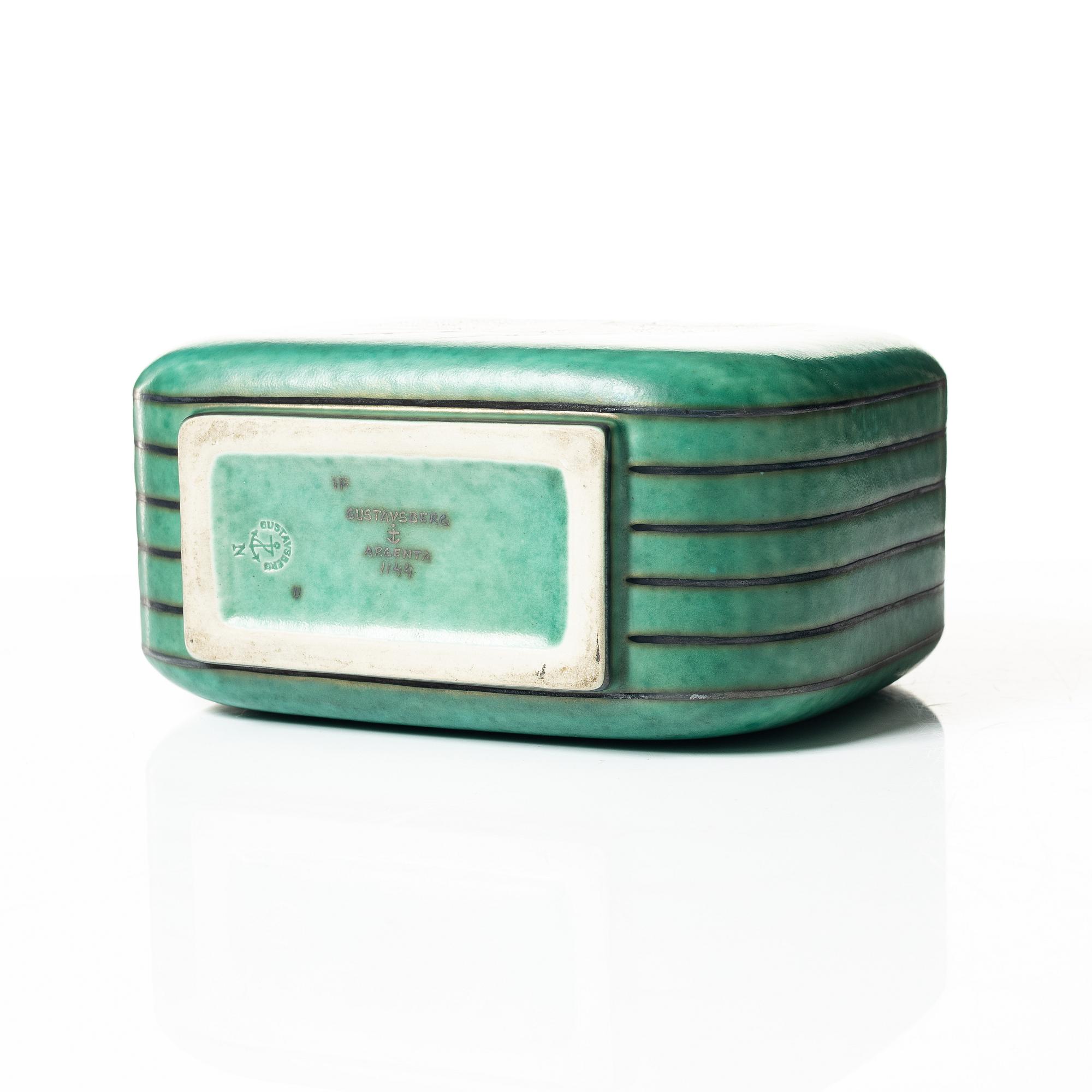 Wilhelm Kåge, an 'Argenta' lidded vase and a plate, Gustavsberg.